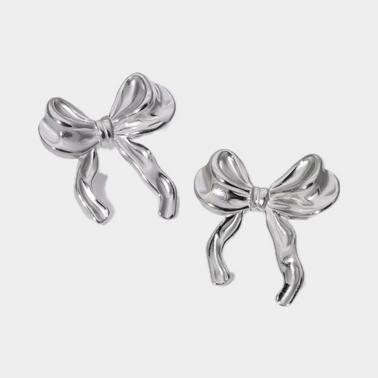 Arete moño plateado